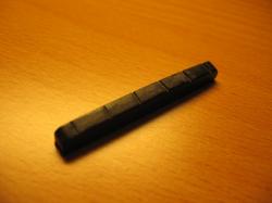 Порожек 41.5х5.2х3.5 мм, с прорезями под струны, черный пластик HOSCO NTC-5